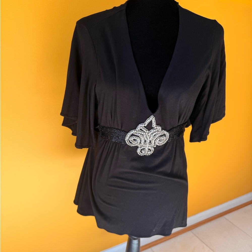Elegant Black Top with Embellished Belt